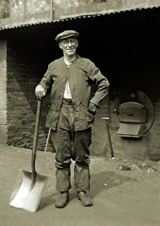 Clipped: Workman with spade