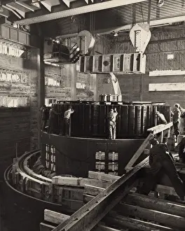 Powerhouse: Workmen installing a generator in the Norris ?