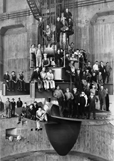 Powerhouse: Workmen pose for a group portrait on the ?