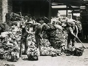 C1930: WORKMEN PREPARING SCRAP