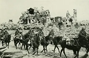 German Offensive: World War 1. British Troops passing the ruins of