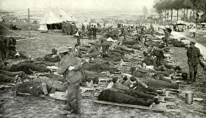 Medical Care: World War 1. Somme Offensive. Rows of wounded men