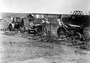 Plows: World War I Farmerettes driving tractors pulling