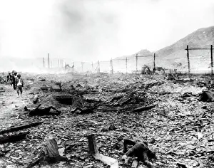 Charred: World War II, charred bodies laying amongst ?