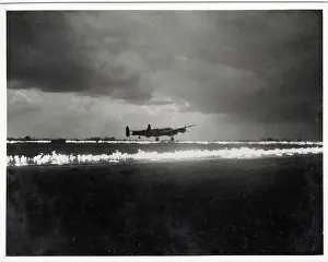 Disperse: World War II Lancaster bomber takes off