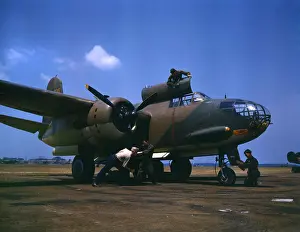 Viginia: World War II, servicing an A-20 bomber, ?