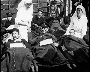 Wounded British Soldiers Lying Happily On Stretchers