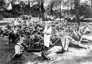 Cigars: Wounded German soldiers on a meadow, 1917