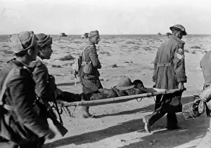 Barrow: Wounded men are rescued at Tobruk, 1941