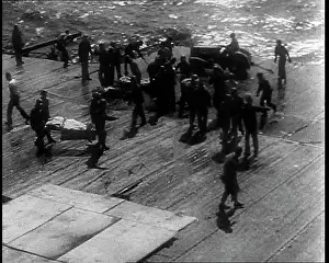 Decks: Wounded Sailor Being Carried Below Decks On