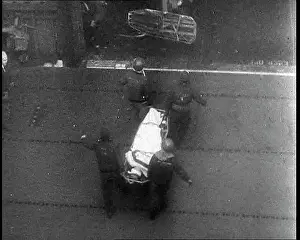 Decks: Wounded Sailor Being Carried Below Decks On
