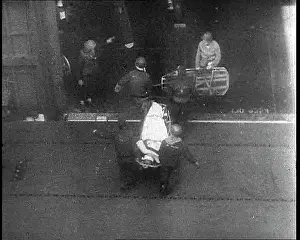 Decks: Wounded Sailor Being Carried Below Decks On
