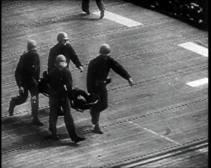 Decks: Wounded Sailor Being Carried Below Decks On