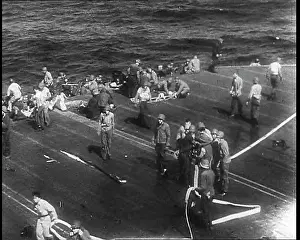 Decks: Wounded Sailor Being Carried Below Decks On