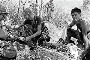 Stocktrek Images: Wounded soldiers are comforted by their comrades
