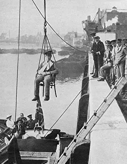 Recuperating: Wounded soldiers lowered by crane, WW1