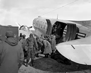 Litters: Wounded U.S. Marines, ROK troops, and British