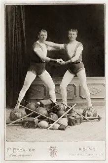 Wrestler: Two wrestler, strong men with their equipment