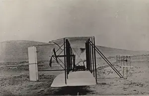 Carolina: The Wright aeroplane from the side at Kitty Hawk