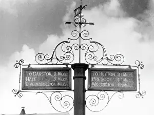 Signposts: WROUGHT IRON ROAD SIGNS