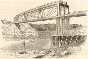 Masterpiece: Wrought iron tubular trussed bridge over the river