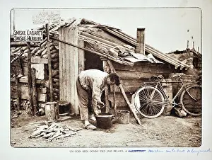 Merkem: WW1 - Soldier working in front of shelter behind frontline