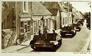 Bren: WW2 - British tanks pass through a village