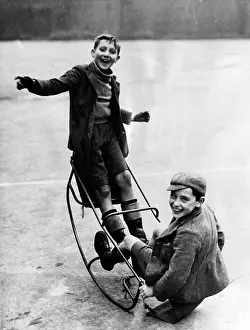 Stoic: WW2 - Home Front - Two boys playing on a see saw