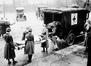 Dogface: WWI, American Red Cross Nurses Loading Patient
