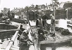 Divers: WWI: divers clearing sunken pontoon bridge, River Oise