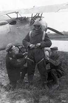 Luftstreitkrafte: WWI, German Pilot Being Fitted with Parachute