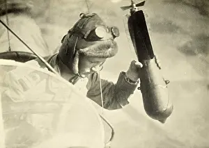 Bombardier: WWI, Pilot Dropping Bomb by Hand