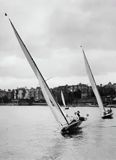 Surbiton: Two yachts on the River Thames in