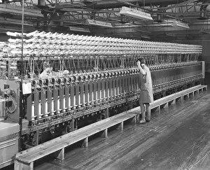 Rows: Yarn rolling machine