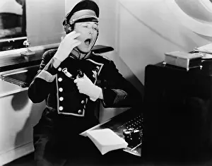 Yawns: Yawning switchboard operator