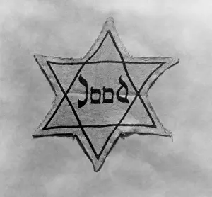 Stigma: Yellow and black star which the Jews were required