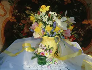 Jonquils: Yellow jug and ribbon with Daffodils etc