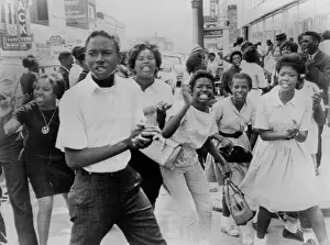 Clog: Young African American demonstrators march ?