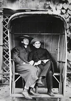 Hooked: Two young American men in coat and