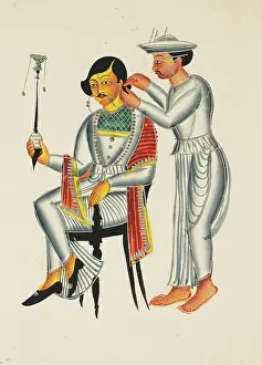 Bengali: Young Bengali having his ears pierced