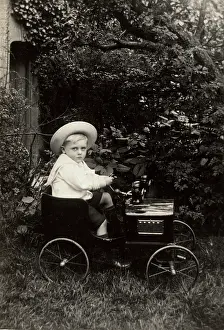 Gocart: Young boy in an elegant toy car