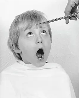 Snip: Young boy having a haircut