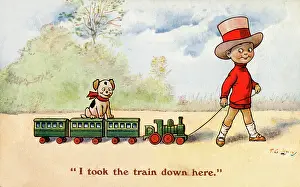 The J Salmon Image Archive (grenville): Young boy pulls along his toy train - puppy takes a ride too