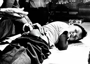 Minn: Young boy receives vaccination in St. Cloud, ?