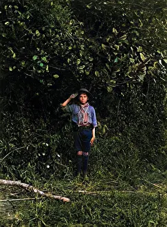 Mauritius: Young boy scout saluting, Mauritius