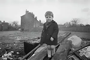 Michael Kay: Young boy on waste land, Manchester