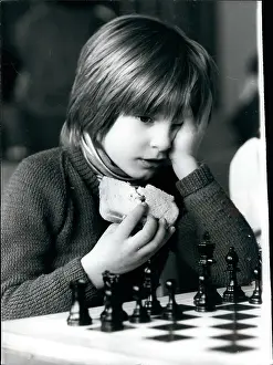 Starcross: Young chess player with sandwich, Islington, North London