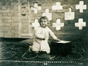 Sepia Images: Young child on an exotic rug, Middle East