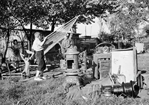 Recycling: Young children collecting scrap for donation