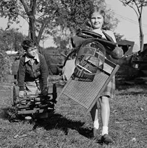 Recycling: Young children collecting scrap for donation